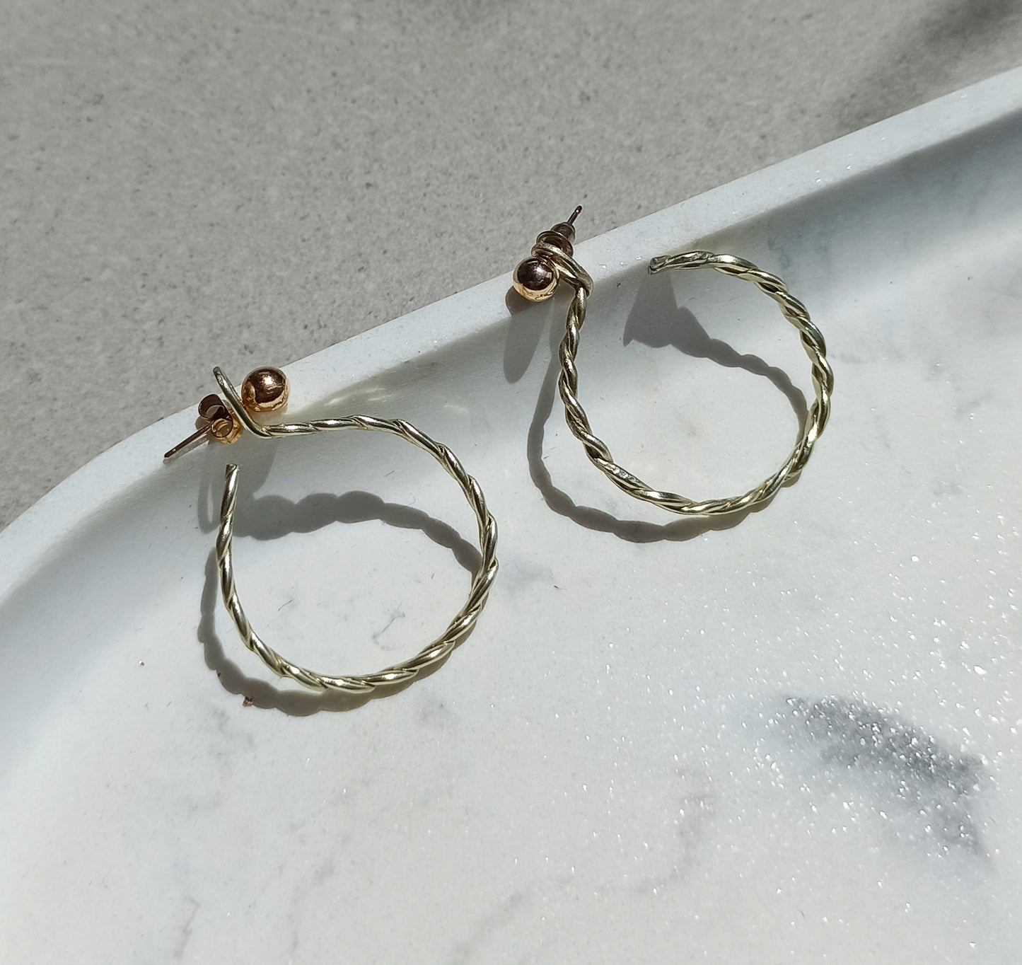 Twisted hoops earring jackets