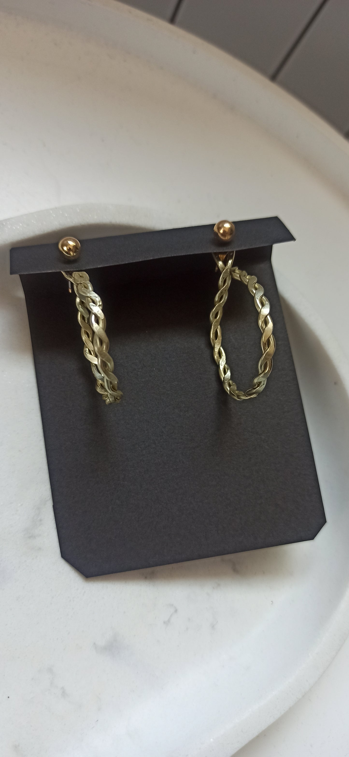 Twisted hoops earring jackets