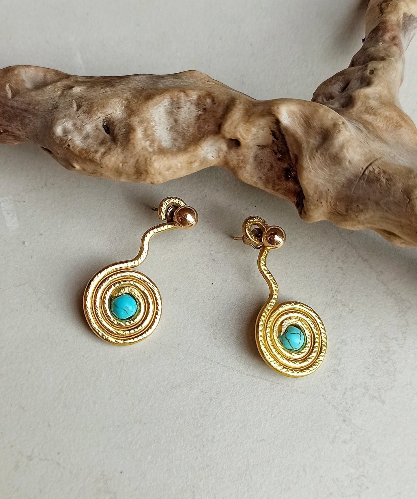 Turquoise spiral ear jacket earrings in gold and silver